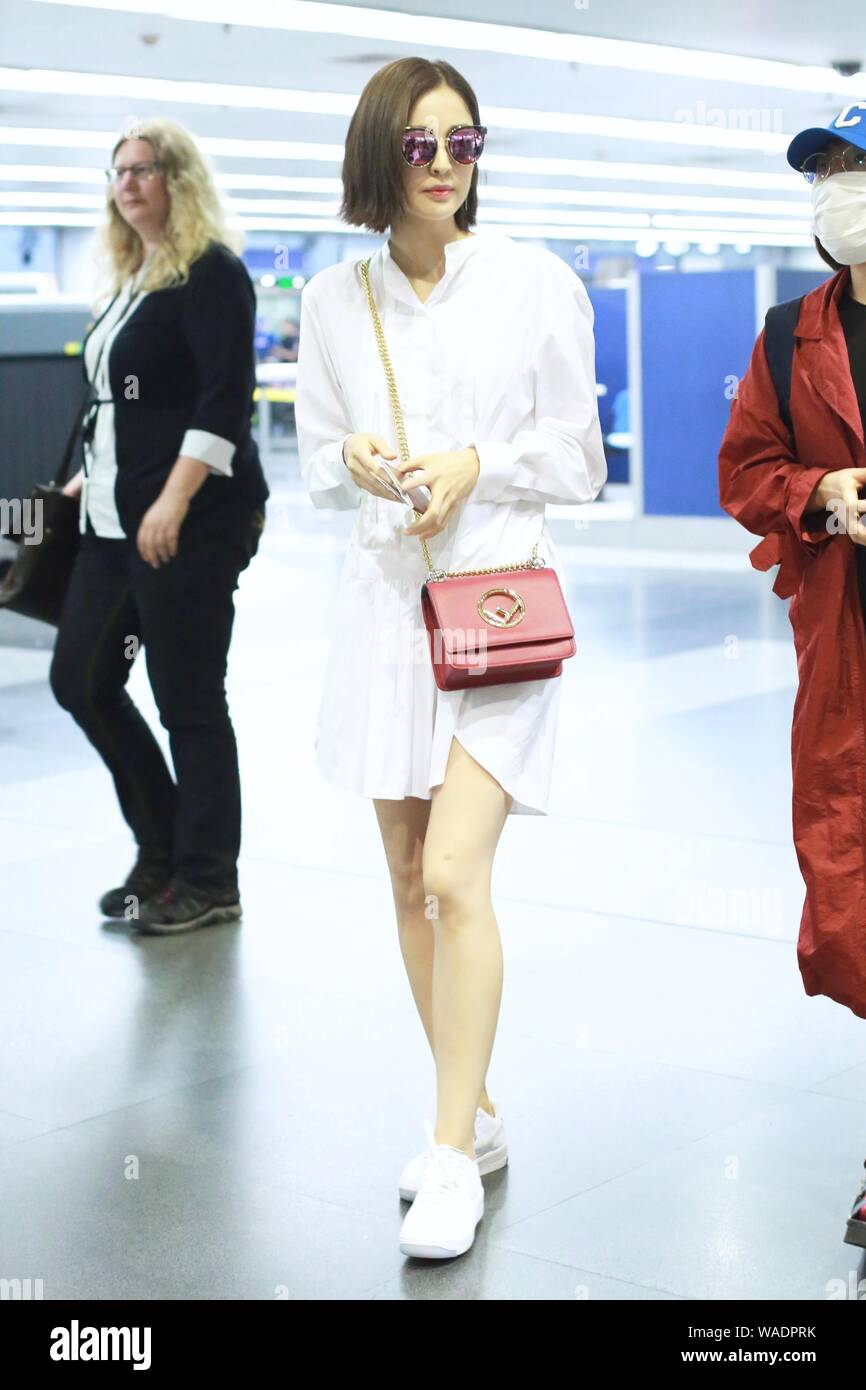Chinese Uigur actress Gulnezer Bextiyar, also known as Gulnazar or Guli Nazha (Gulinazha), arrives at the Beijing Capital International Airport before Stock Photo