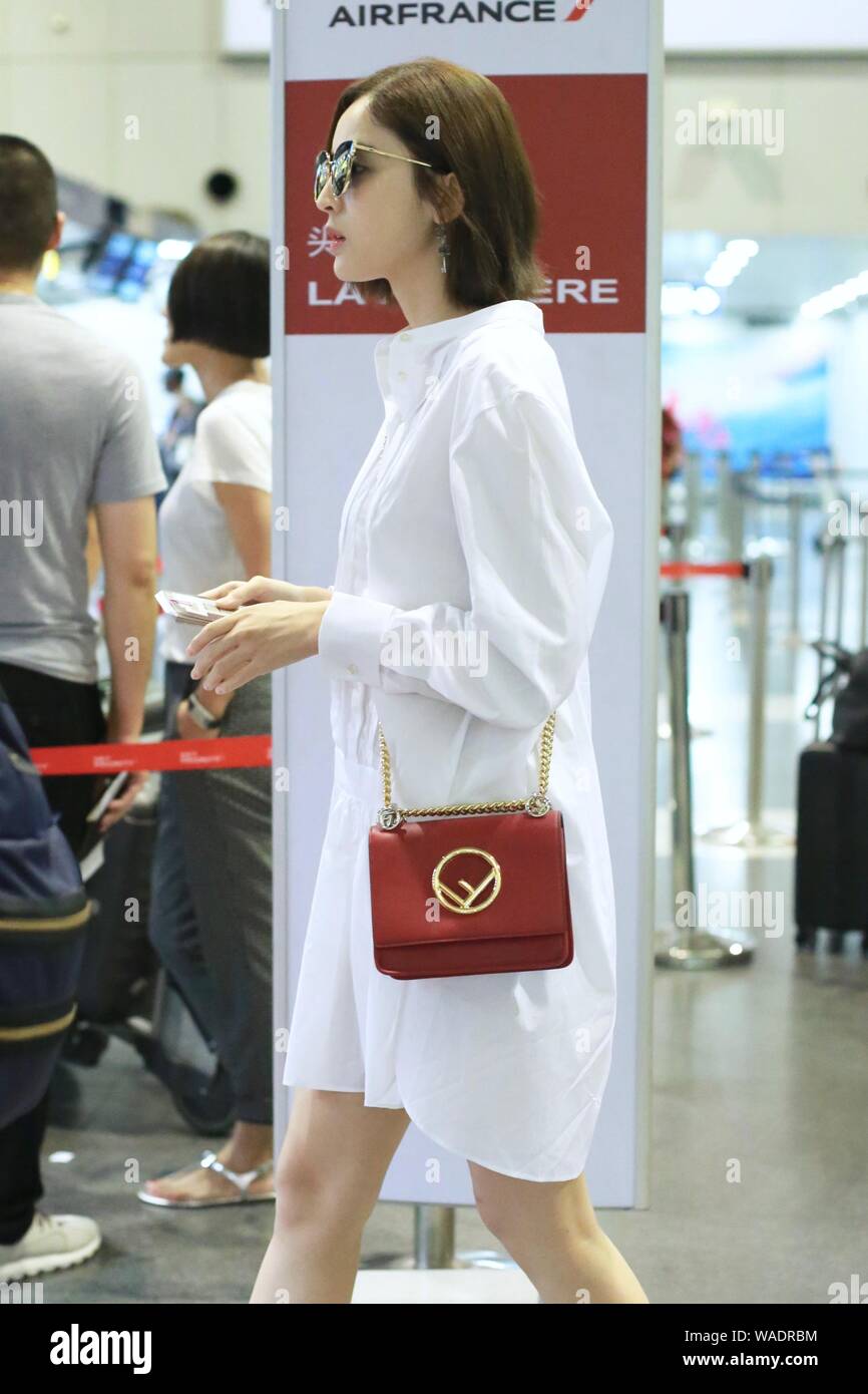 Chinese Uigur actress Gulnezer Bextiyar, also known as Gulnazar or Guli Nazha (Gulinazha), arrives at the Beijing Capital International Airport before Stock Photo