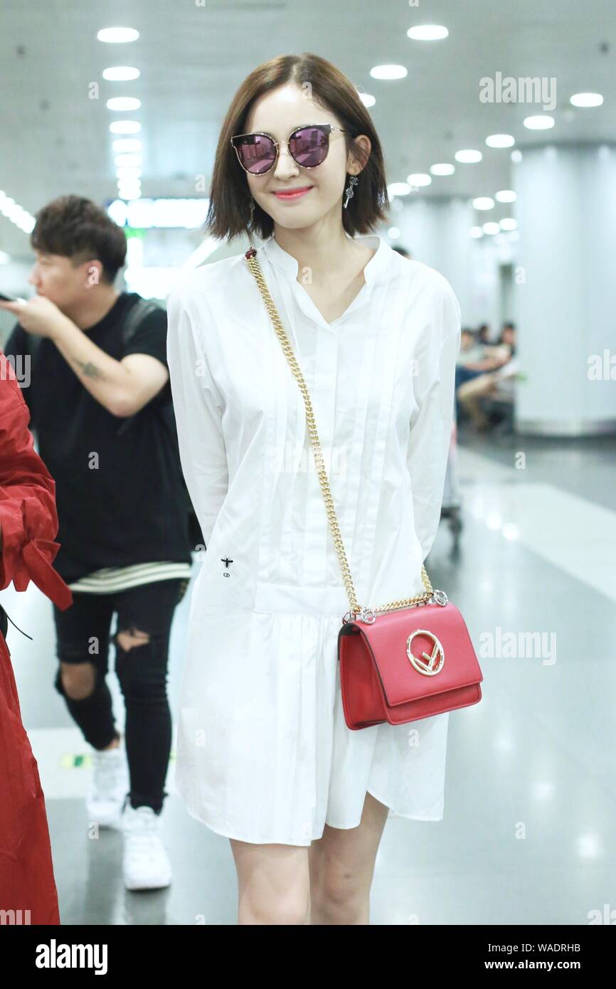 Chinese Uigur actress Gulnezer Bextiyar, also known as Gulnazar or Guli Nazha (Gulinazha), arrives at the Beijing Capital International Airport before Stock Photo