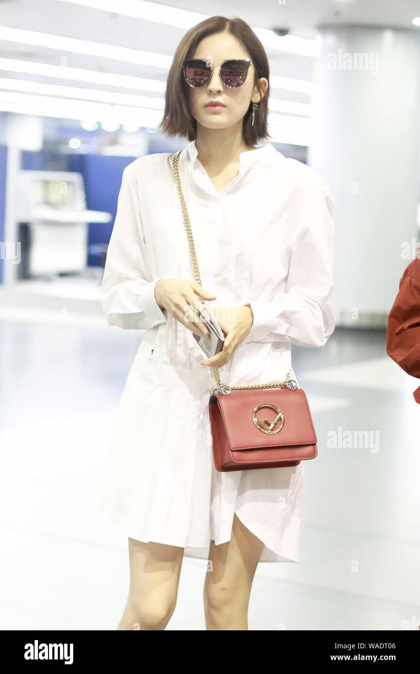 Chinese Uigur actress Gulnezer Bextiyar, also known as Gulnazar or Guli Nazha (Gulinazha), arrives at the Beijing Capital International Airport before Stock Photo