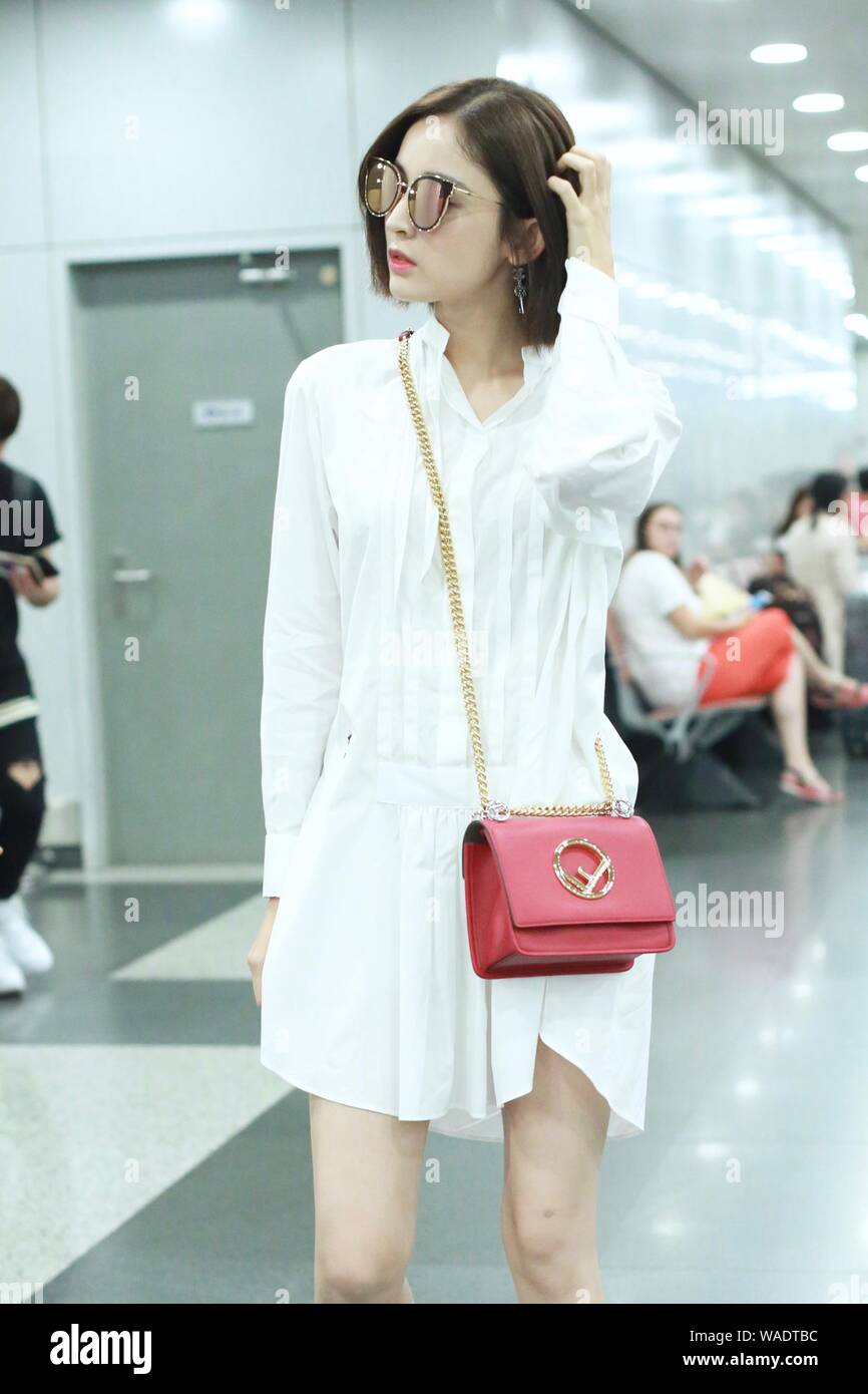 Chinese Uigur actress Gulnezer Bextiyar, also known as Gulnazar or Guli Nazha (Gulinazha), arrives at the Beijing Capital International Airport before Stock Photo