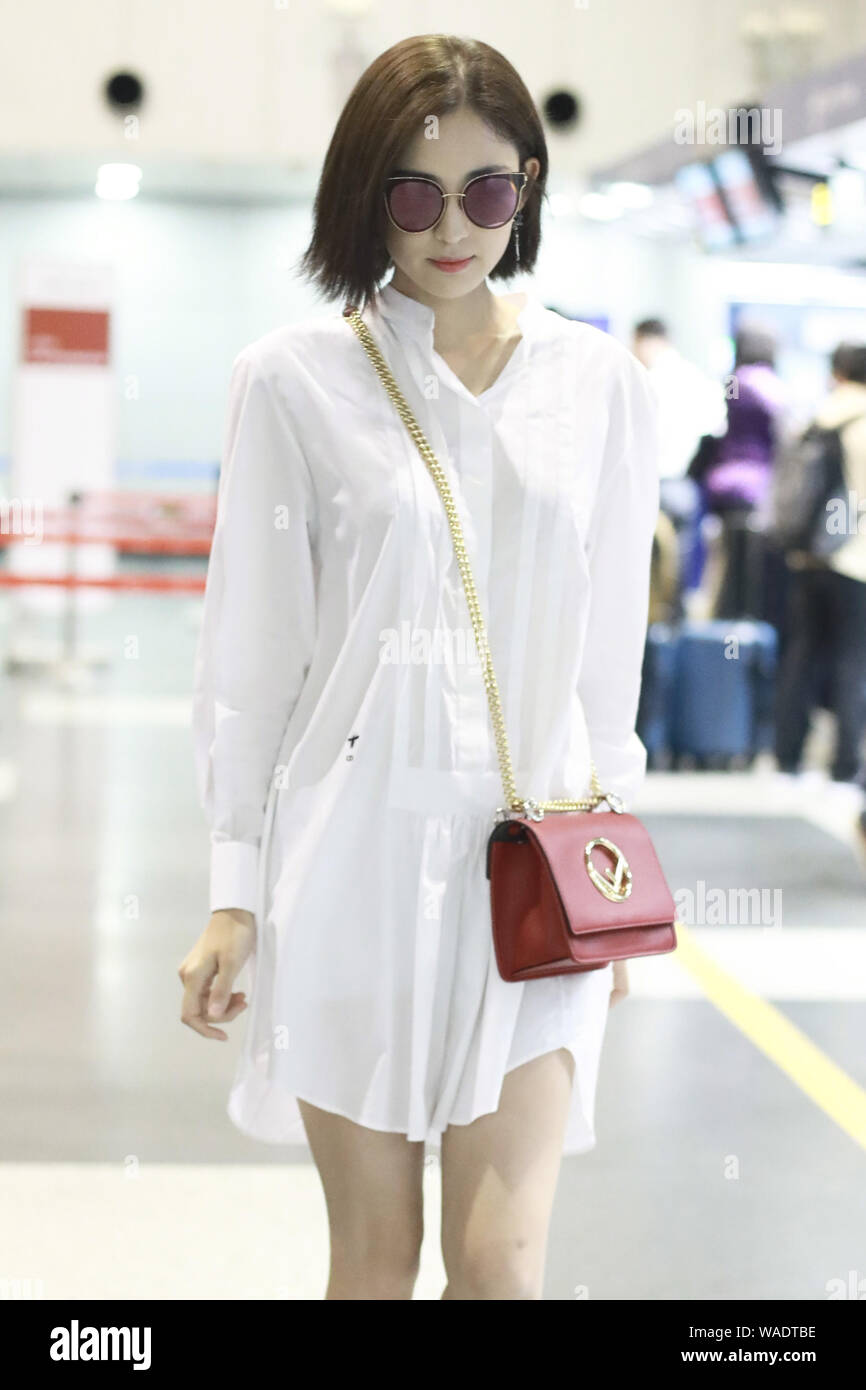 Chinese Uigur actress Gulnezer Bextiyar, also known as Gulnazar or Guli Nazha (Gulinazha), arrives at the Beijing Capital International Airport before Stock Photo