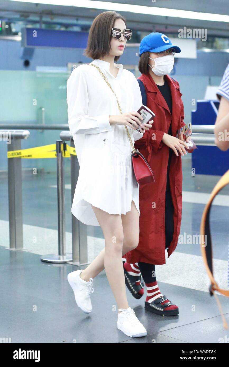 Chinese Uigur actress Gulnezer Bextiyar, also known as Gulnazar or Guli Nazha (Gulinazha), arrives at the Beijing Capital International Airport before Stock Photo