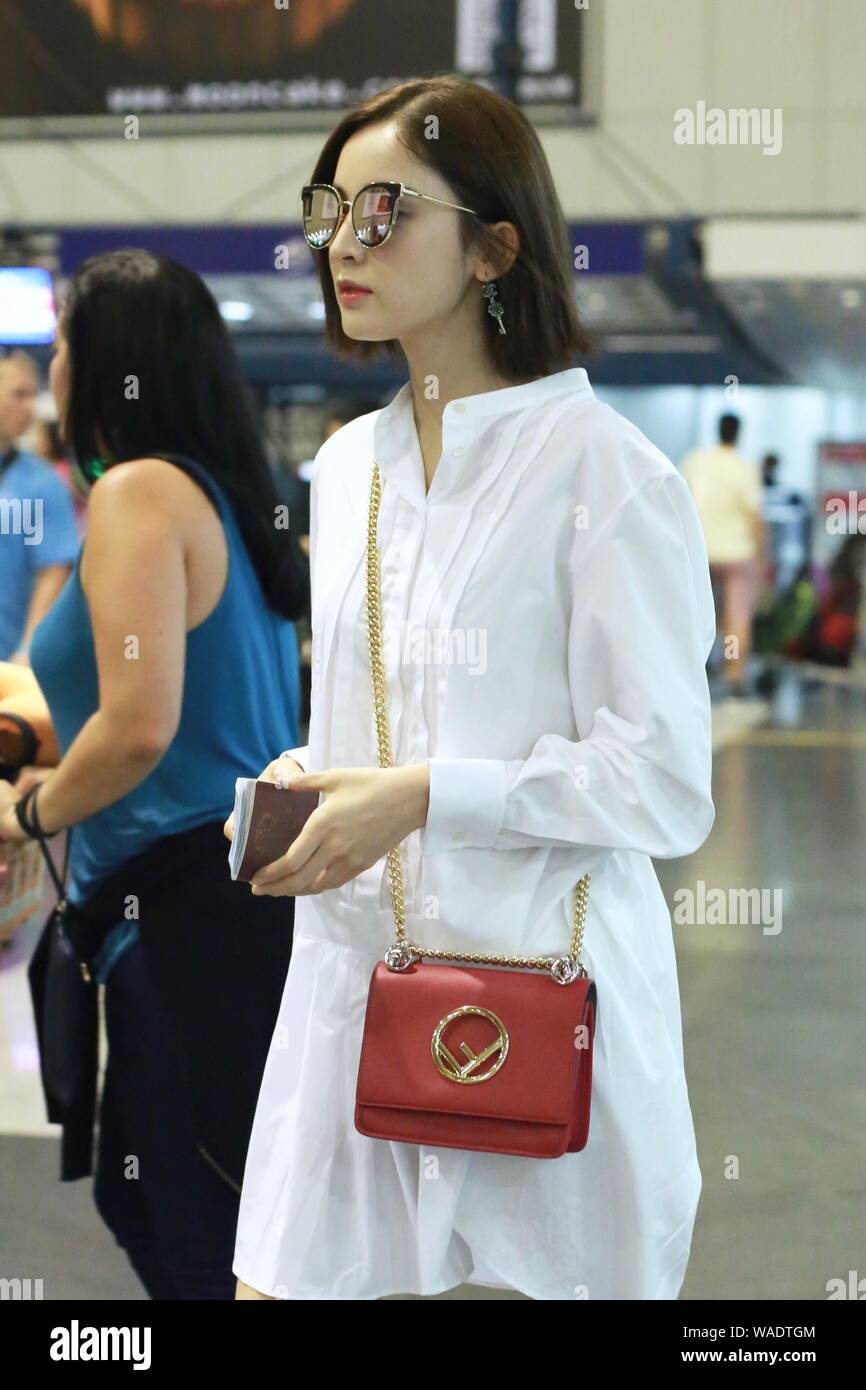 Chinese Uigur actress Gulnezer Bextiyar, also known as Gulnazar or Guli Nazha (Gulinazha), arrives at the Beijing Capital International Airport before Stock Photo