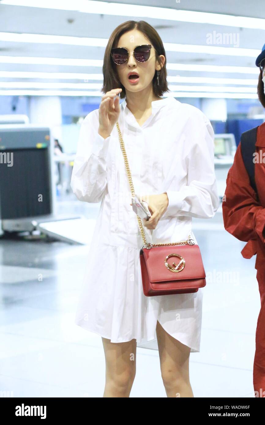 Chinese Uigur actress Gulnezer Bextiyar, also known as Gulnazar or Guli Nazha (Gulinazha), arrives at the Beijing Capital International Airport before Stock Photo