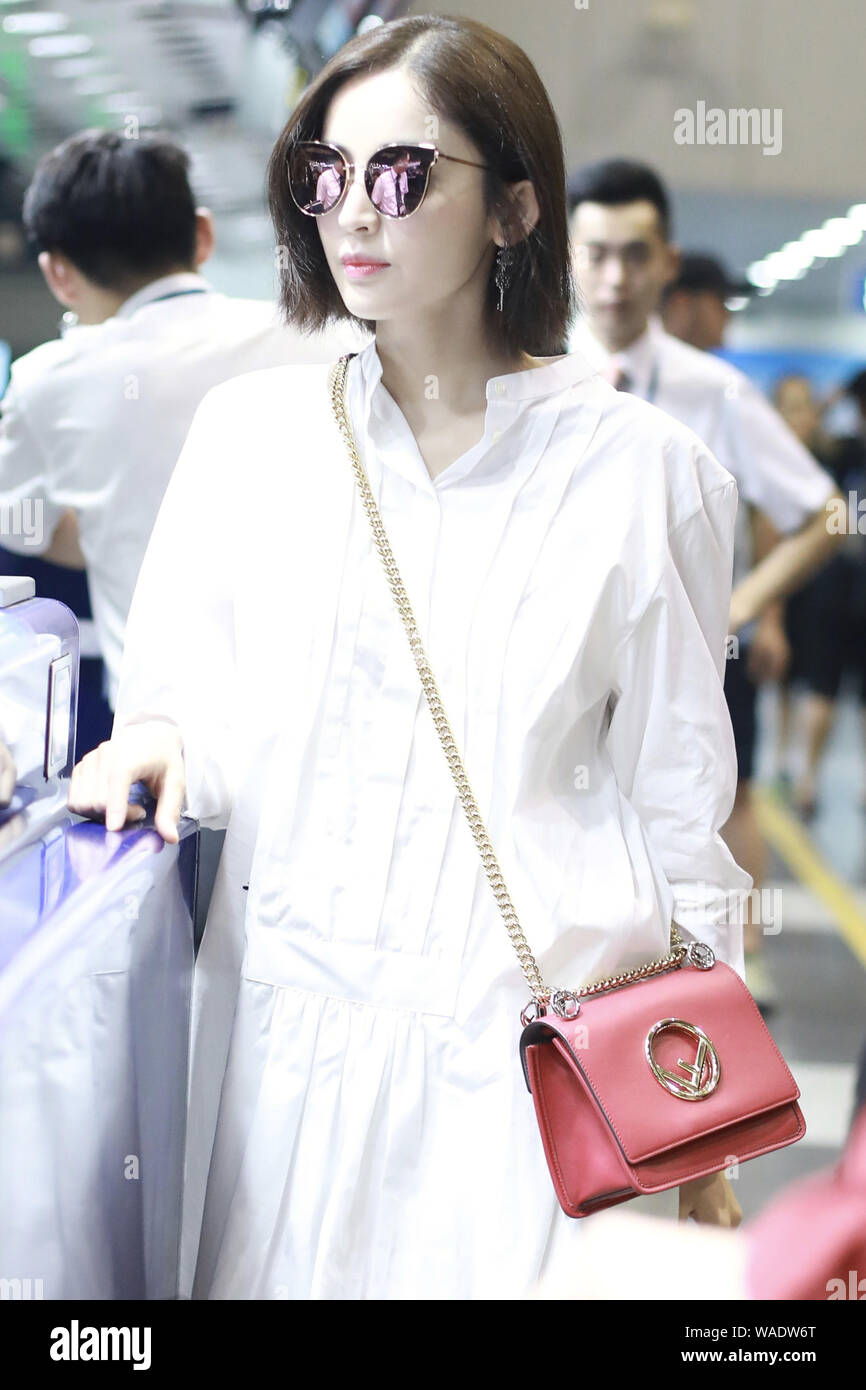 Chinese Uigur actress Gulnezer Bextiyar, also known as Gulnazar or Guli Nazha (Gulinazha), arrives at the Beijing Capital International Airport before Stock Photo
