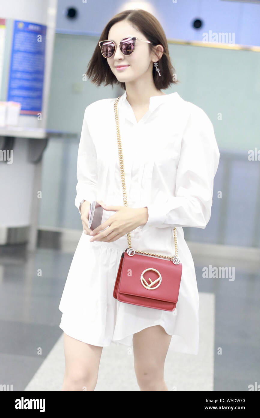 Chinese Uigur actress Gulnezer Bextiyar, also known as Gulnazar or Guli Nazha (Gulinazha), arrives at the Beijing Capital International Airport before Stock Photo