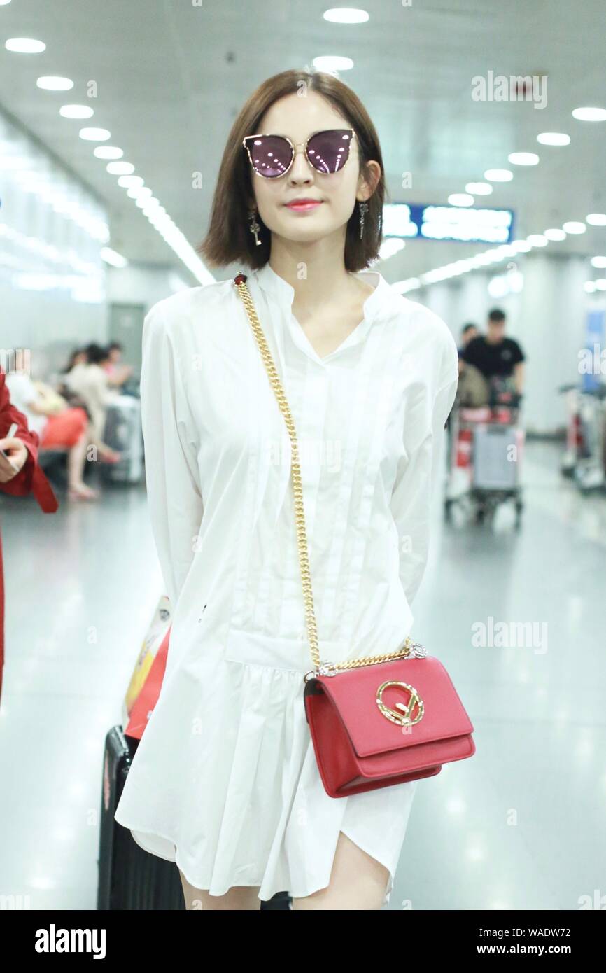 Chinese Uigur actress Gulnezer Bextiyar, also known as Gulnazar or Guli Nazha (Gulinazha), arrives at the Beijing Capital International Airport before Stock Photo