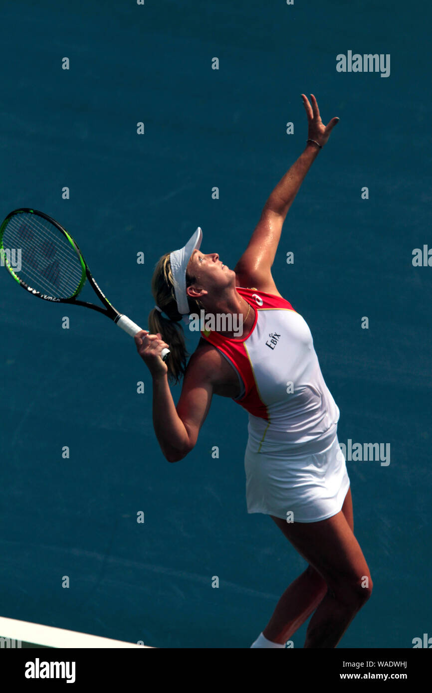 Crotona Park, Bronx, New York -- Coco Vandeweghe of the, United States. 19th Aug, 2019. serving Anna Blinkova of Russia during the opening day of play at the NYJTL Bronx Open at the Cary Leeds Tennis Center, in Crotona Park in New York's Bronx. Vandeweghe lost the match 6-3, 6-0. The tournament which is free to the public is the first professional tournament in the Bronx since 2012. Credit: Adam Stoltman/Alamy Live News Stock Photo
