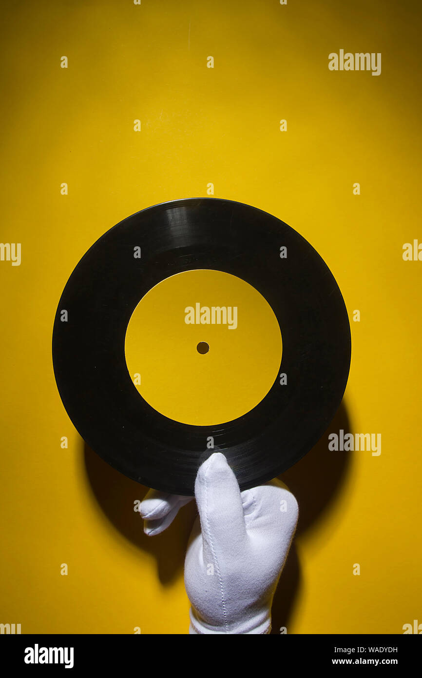 Hand holding vinyl record in hires stock photography and images Alamy