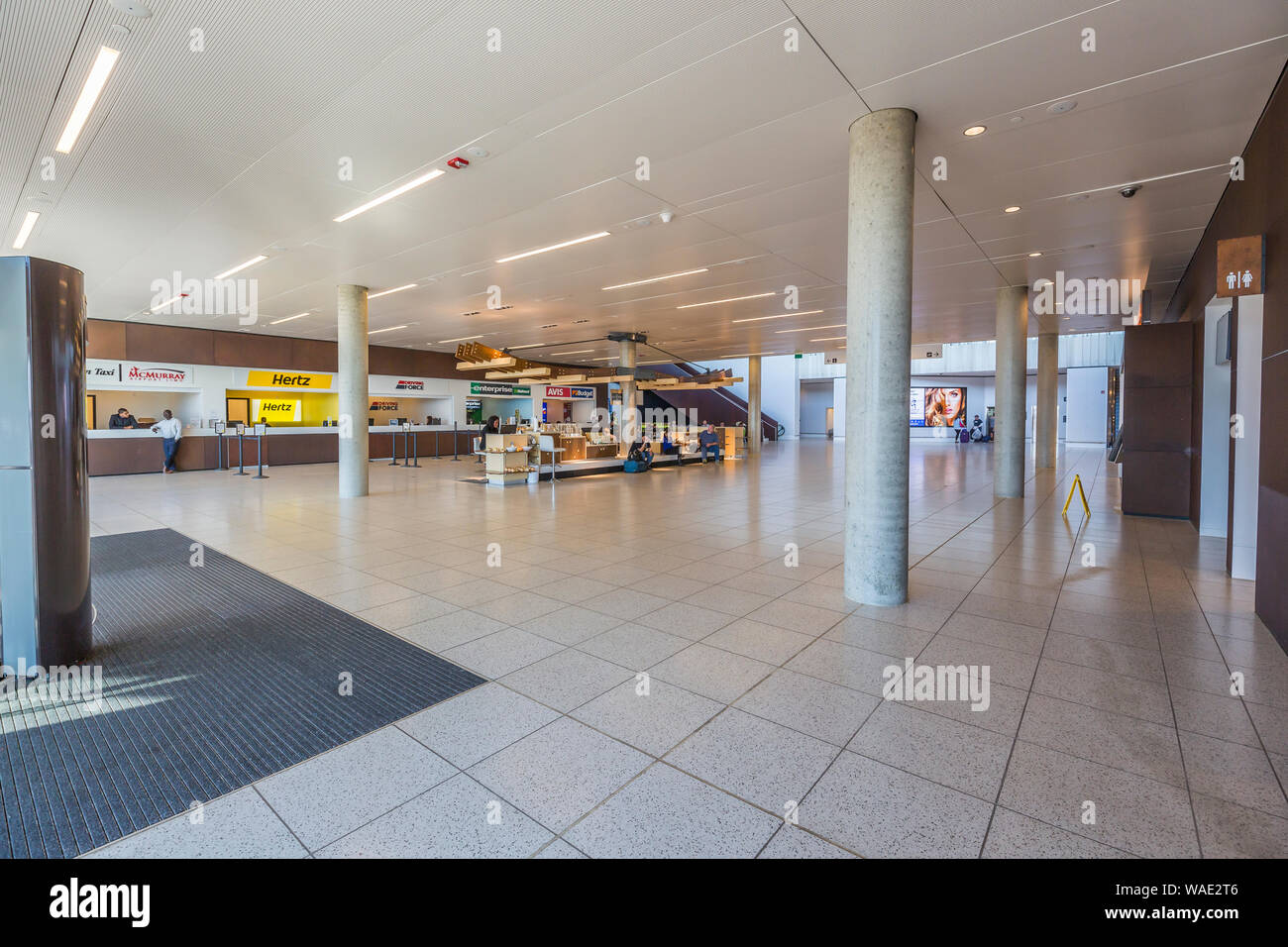 Terminal building interior at  Fort McMurray International Airport. Stock Photo