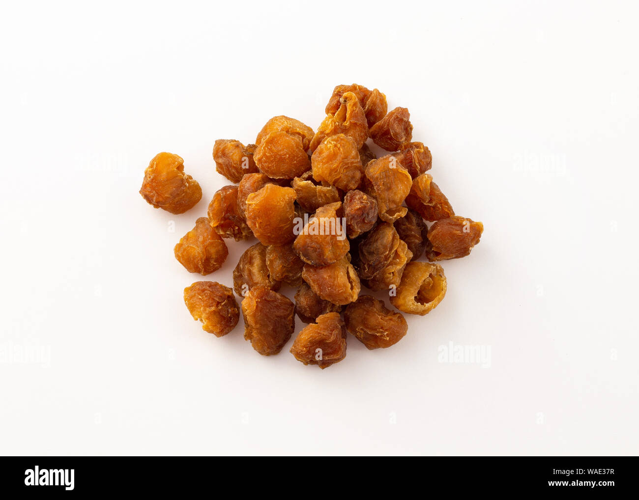 group of dried longan fruit on white background Stock Photo - Alamy
