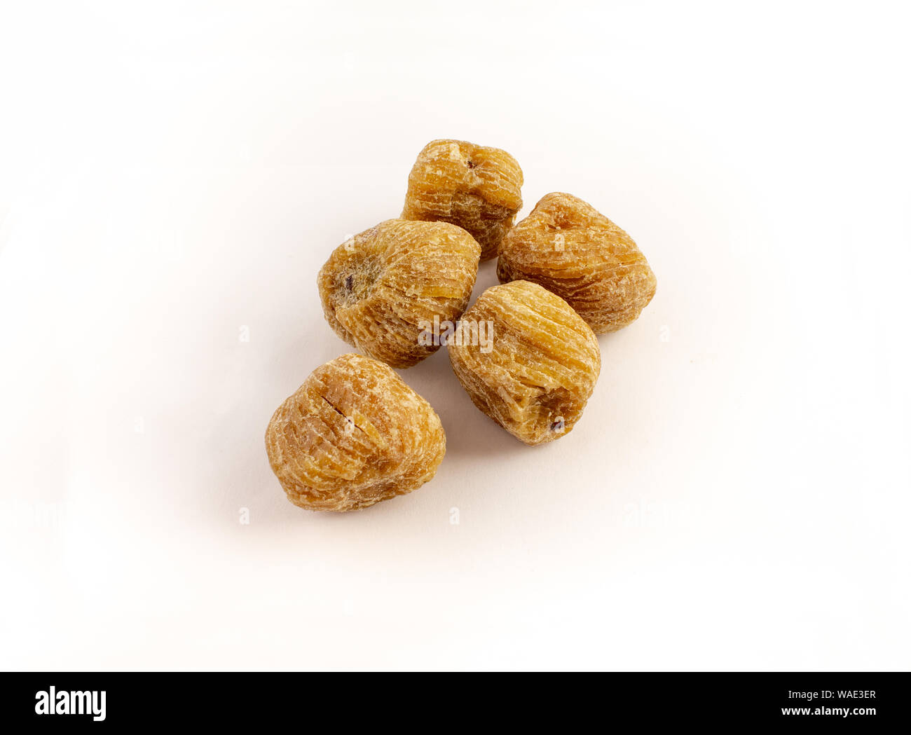 dried sweet honey dates on white background Stock Photo Alamy