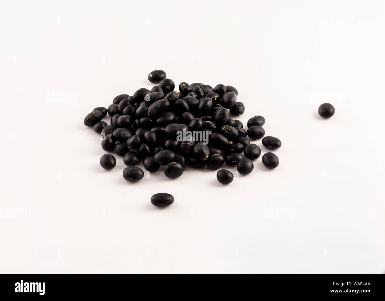 group of dried black beans on white background Stock Photo Alamy