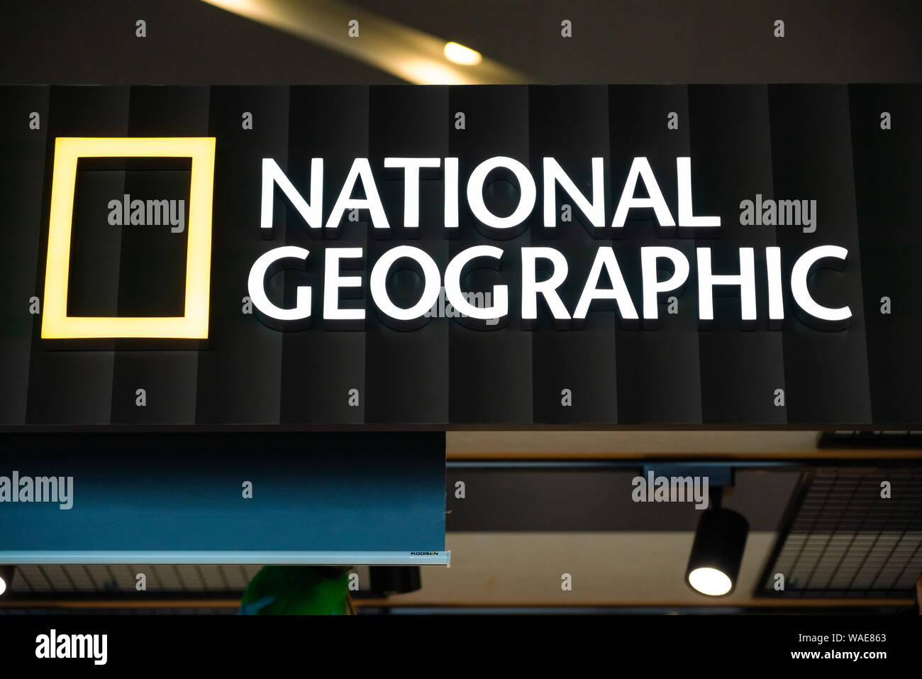 National Geographic logo, one of the largest non-profit scientific and educational organisations, seen in Shanghai Hongqiao International Airport. Stock Photo