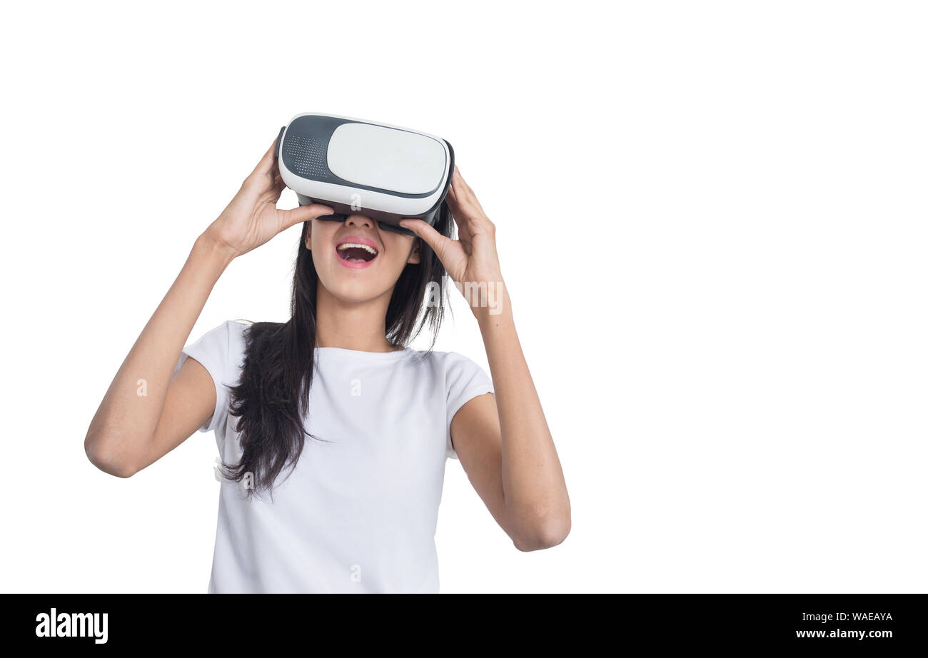 Women using VR-headset glasses of virtual reality on isolated white background,future technology concept. Stock Photo