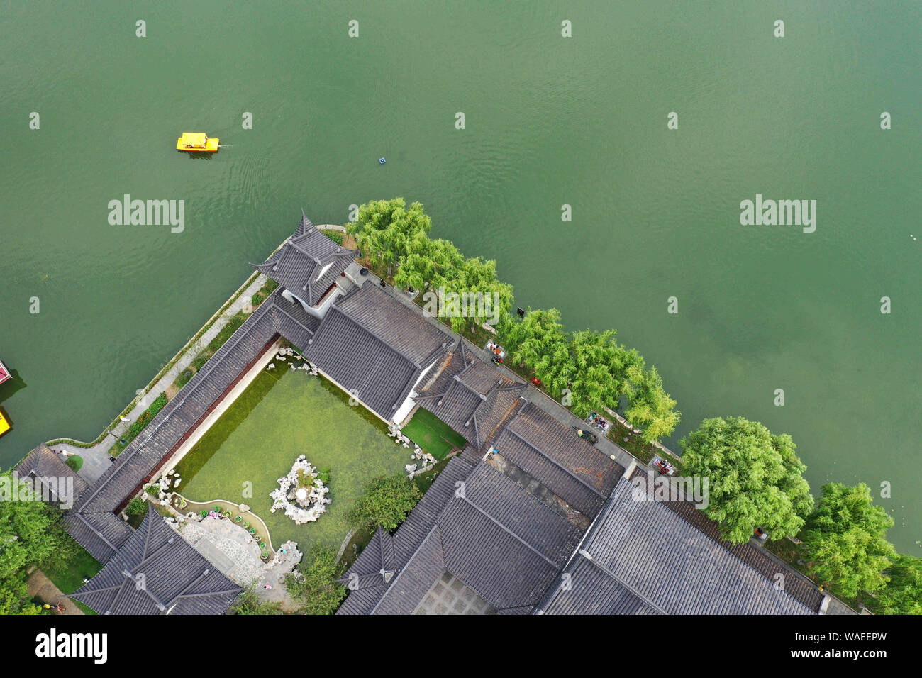 Jiangsu, Jiangsu, China. 20th Aug, 2019. Nanjing, CHINA-Aerial photo of Mochou lake park in Nanjing, east China's Jiangsu province, Aug. 18, 2019.Mochou lake is a famous classical garden in the south of the Yangtze river with a long history of 1500 years and rich cultural resources.Since ancient times, it has been known as ''the first lake in Jiangnan'', ''the first scenic spot in Jinling'' and ''the first of forty-eight scenic spots in Jinling' Credit: SIPA Asia/ZUMA Wire/Alamy Live News Stock Photo