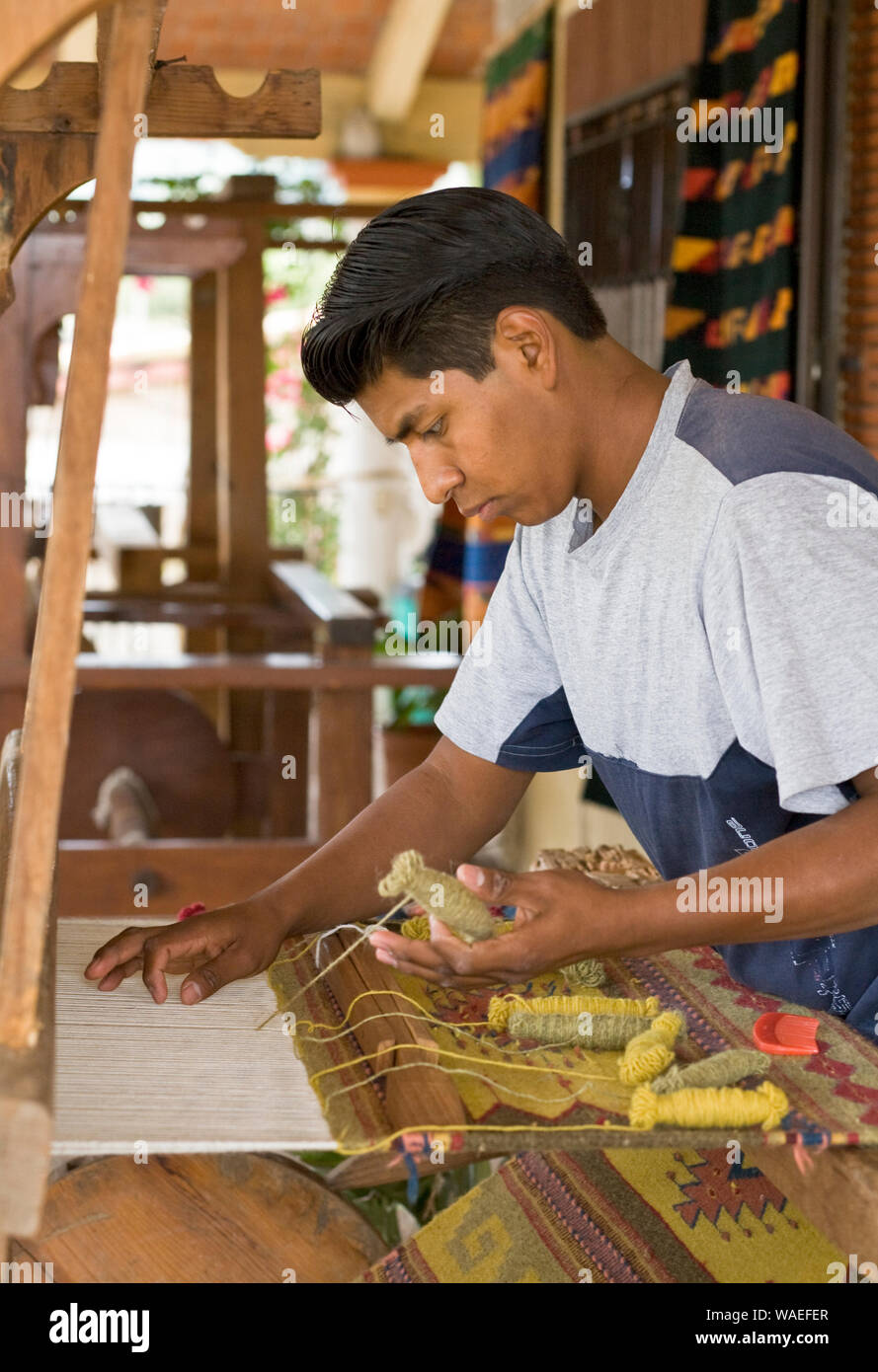 Mexican indigenous people artisan man weaving traditional Zapotec style