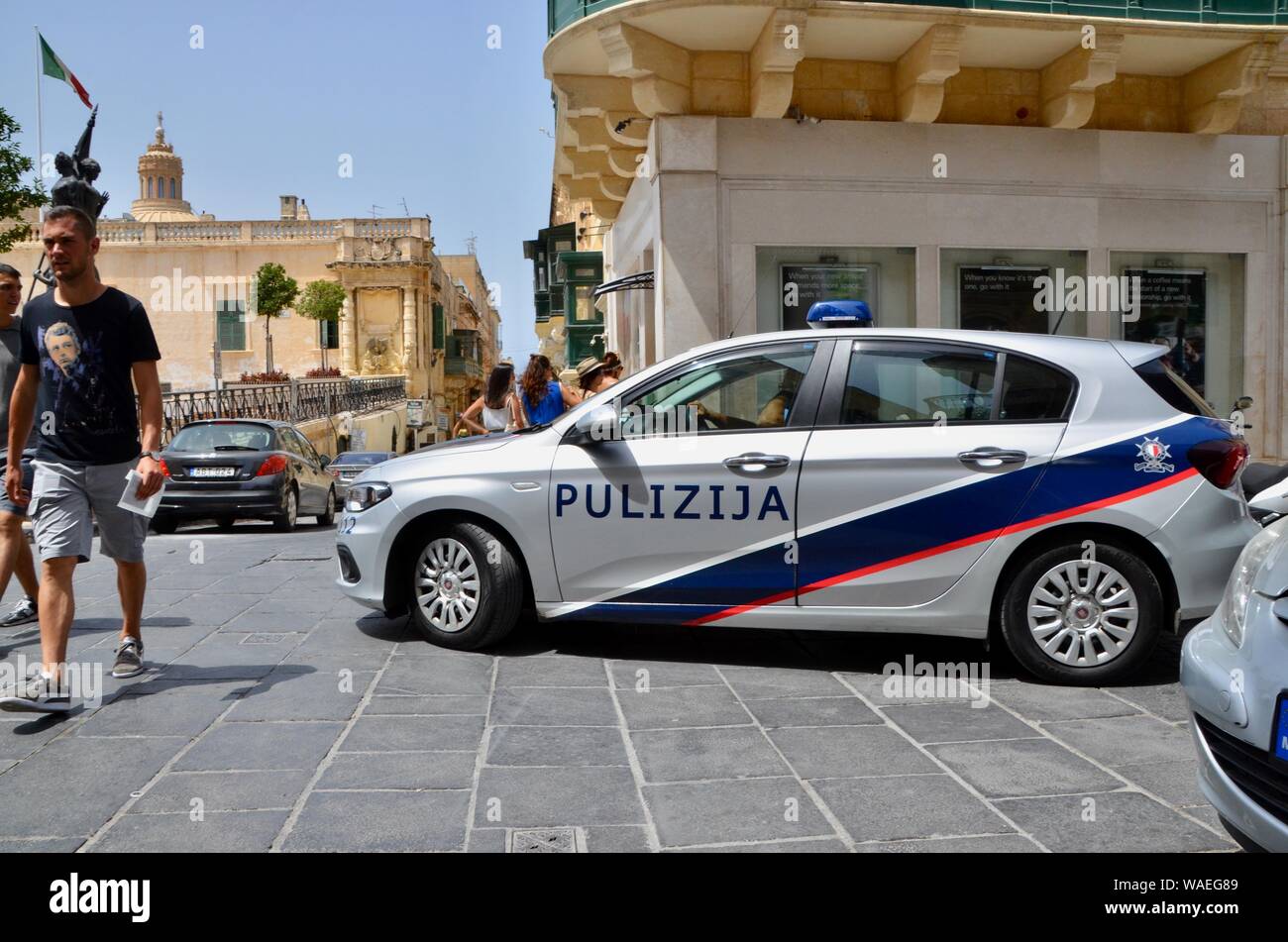 maltese police car on patrol valletta Stock Photo Alamy