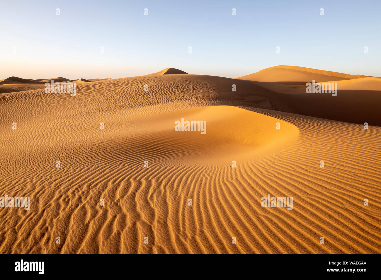 The vastness of the Sahara Desert in Morocco and the ever-shifting 