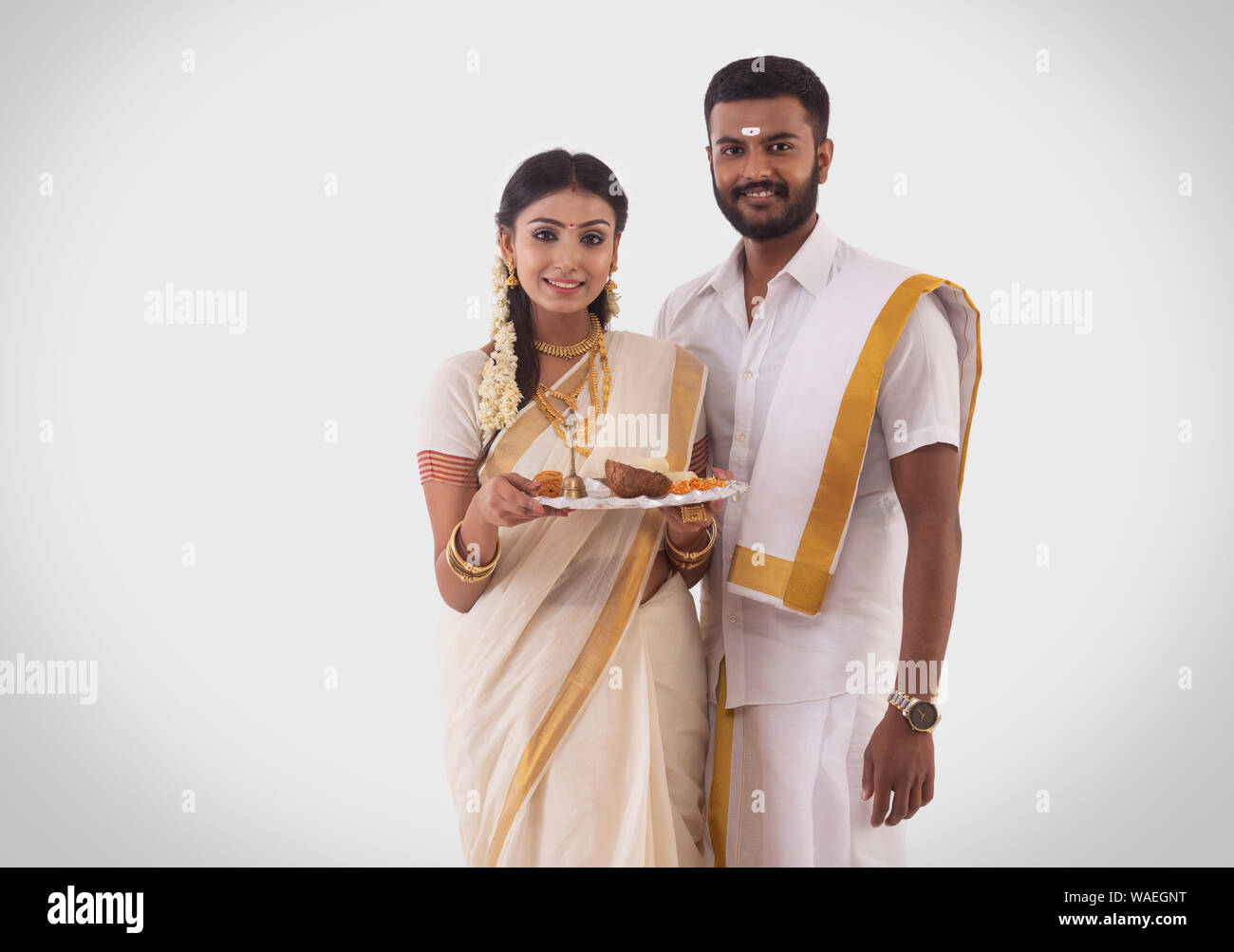 portrait of a south indian couple celebrating onam Stock Photo