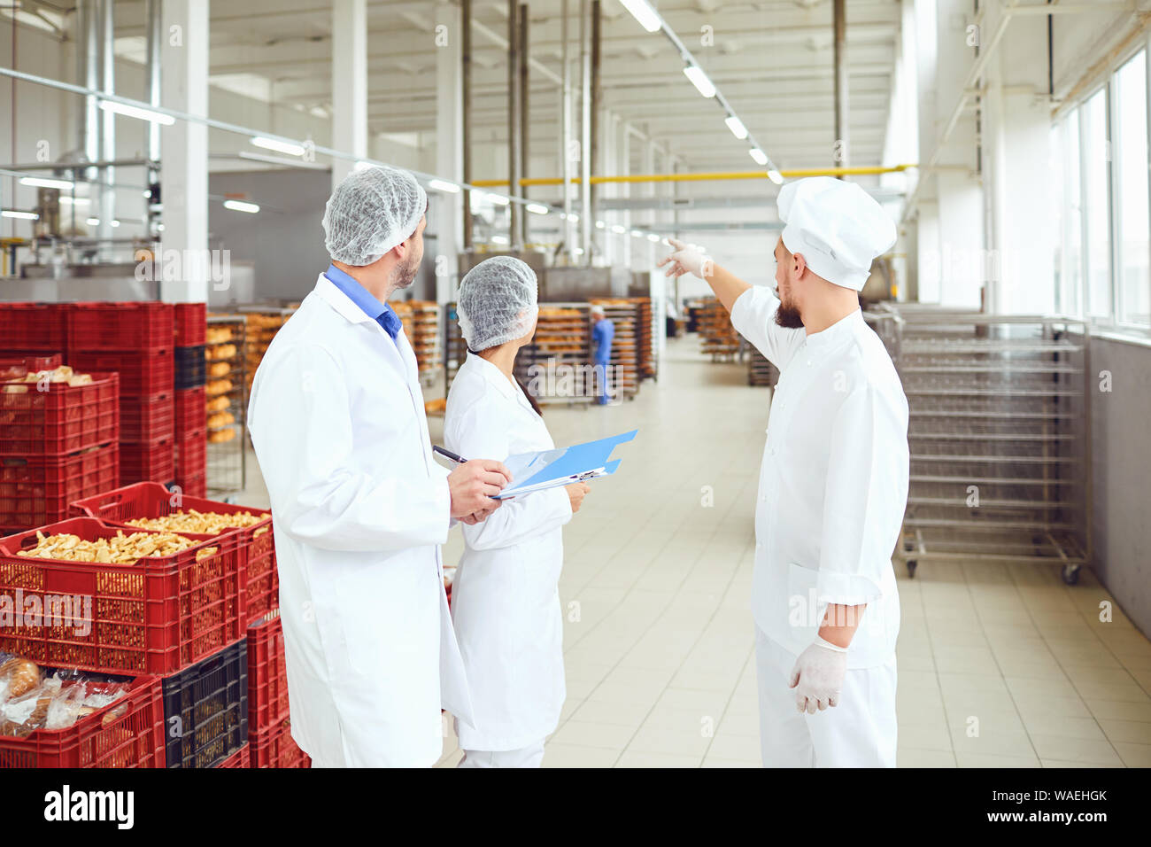 The production supervisor does the inspection at the warehouse Stock Photo