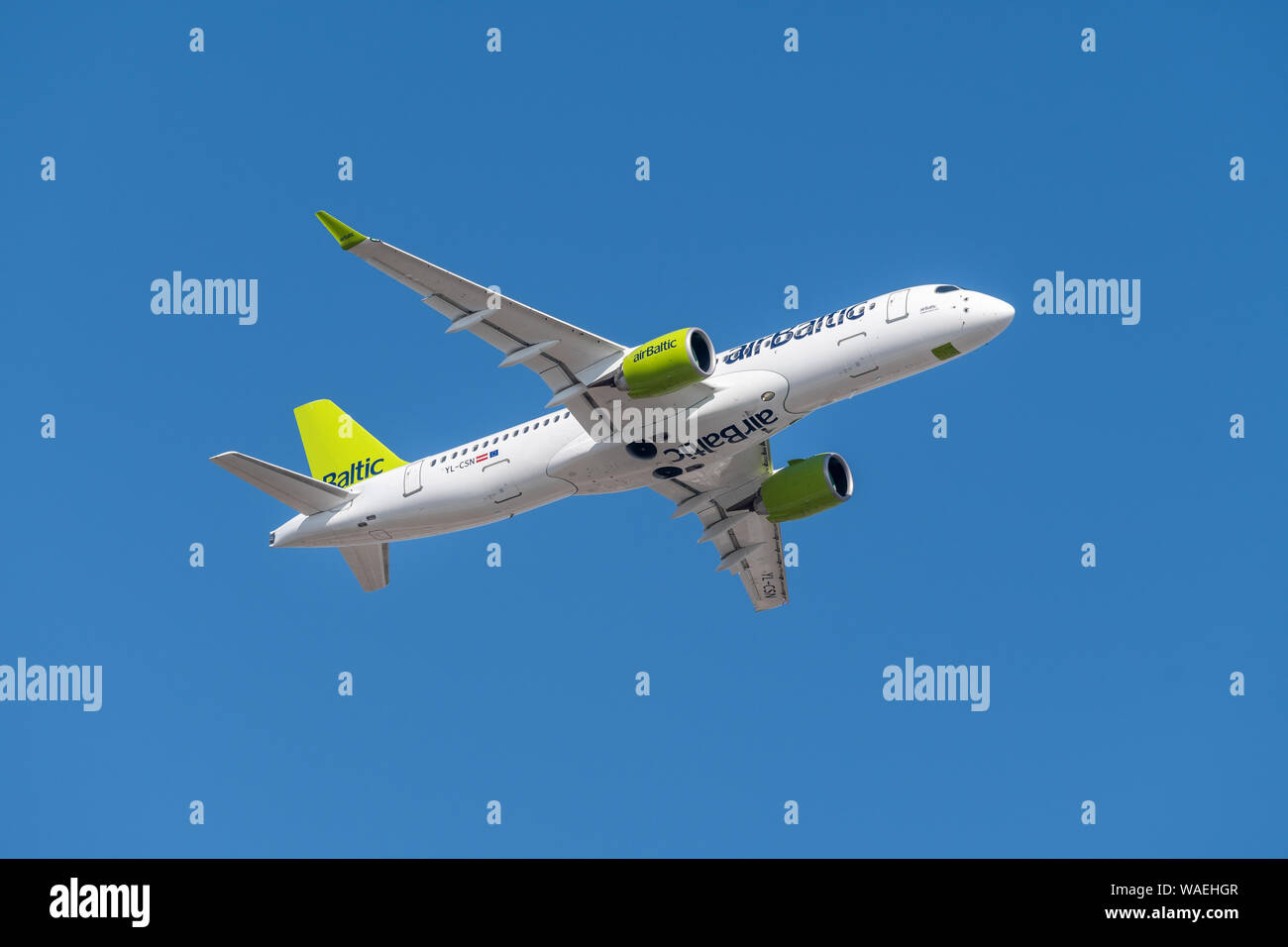 Munich, Germany - March 31. 2019 : Air Baltic Airbus A220-300 with the aircraft registration number YL-CSN during take off on the southern runway 08R Stock Photo
