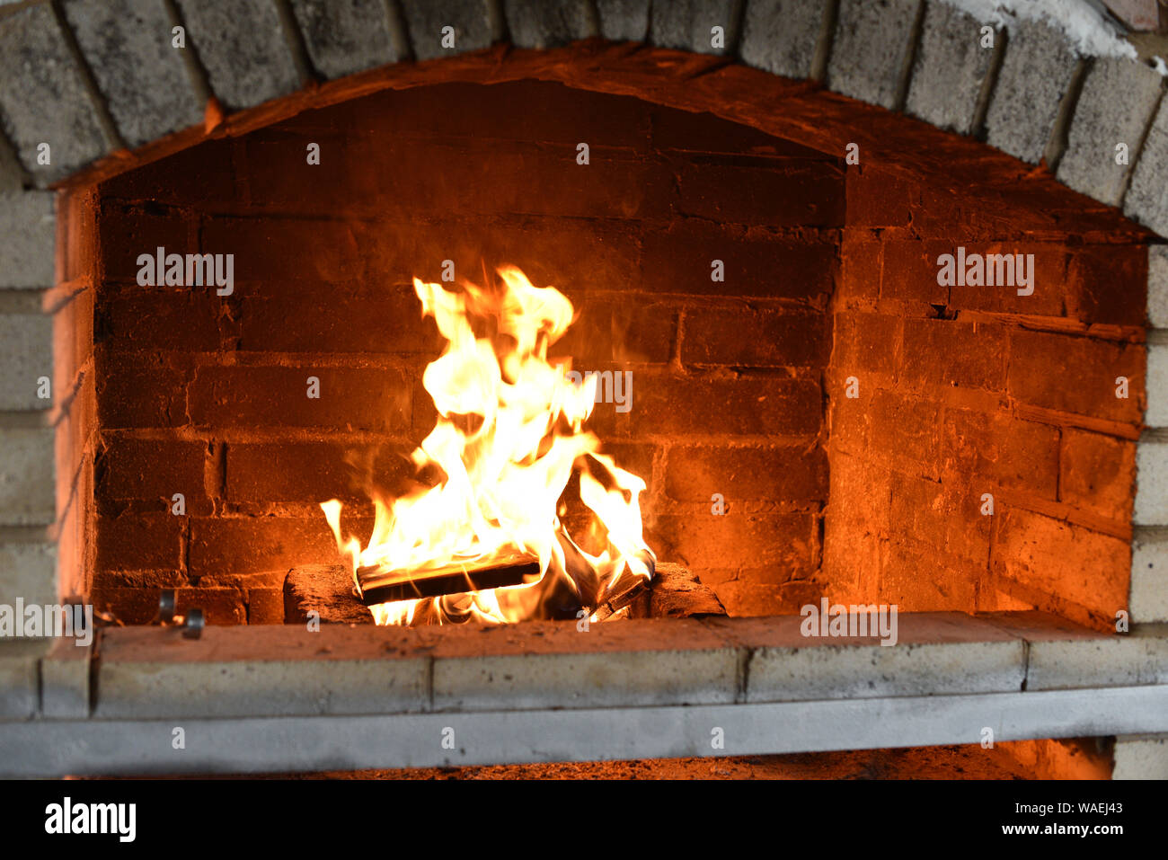 Fire Wood Burning In The Oven Fire In A Stone Stove The Stove On