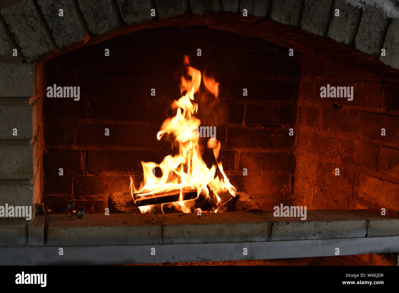 Fire Wood Burning In The Oven Fire In A Stone Stove The Stove On