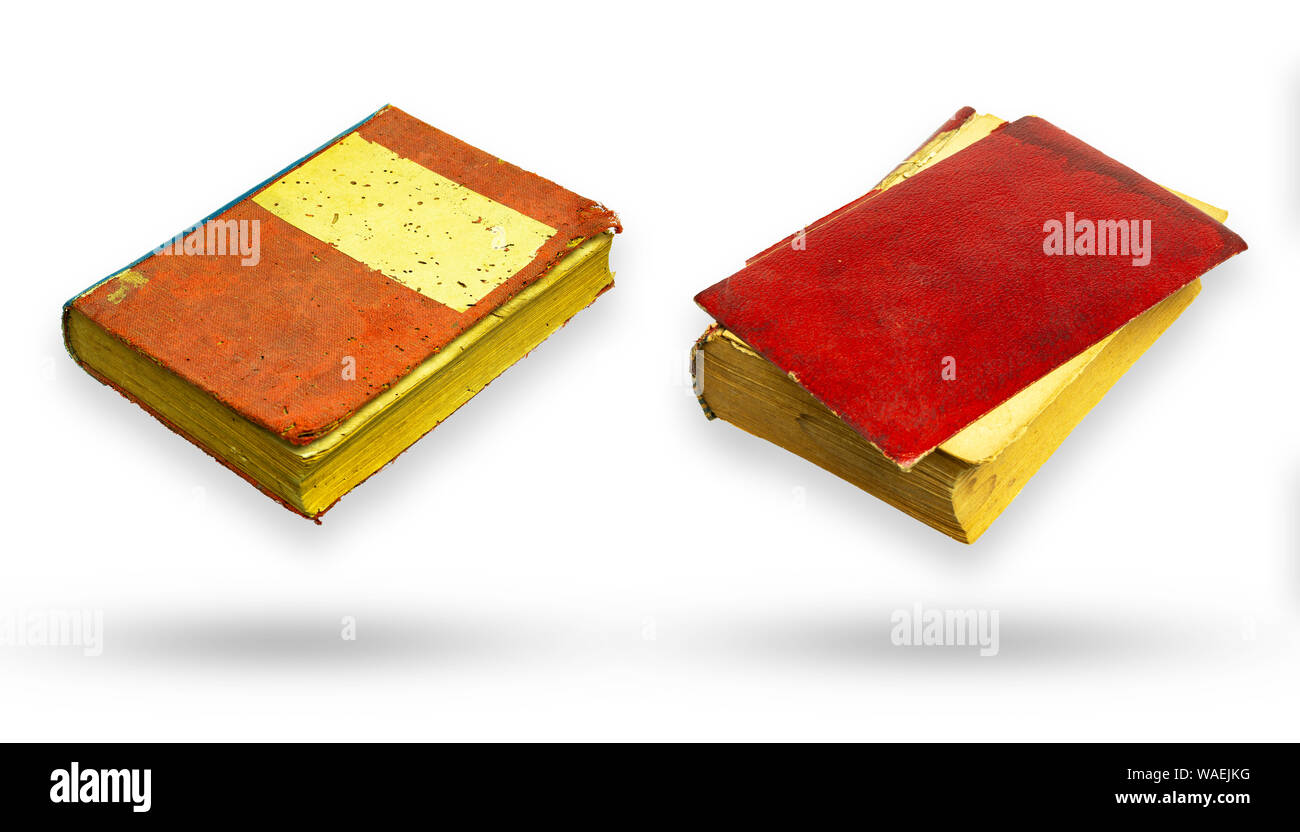 Red canvas and red leather cover old book. Isolate and clipping path on white background. Stock Photo