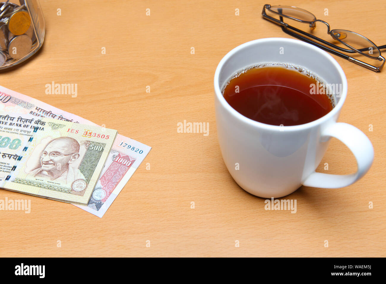 Budget planning with tea Stock Photo Alamy