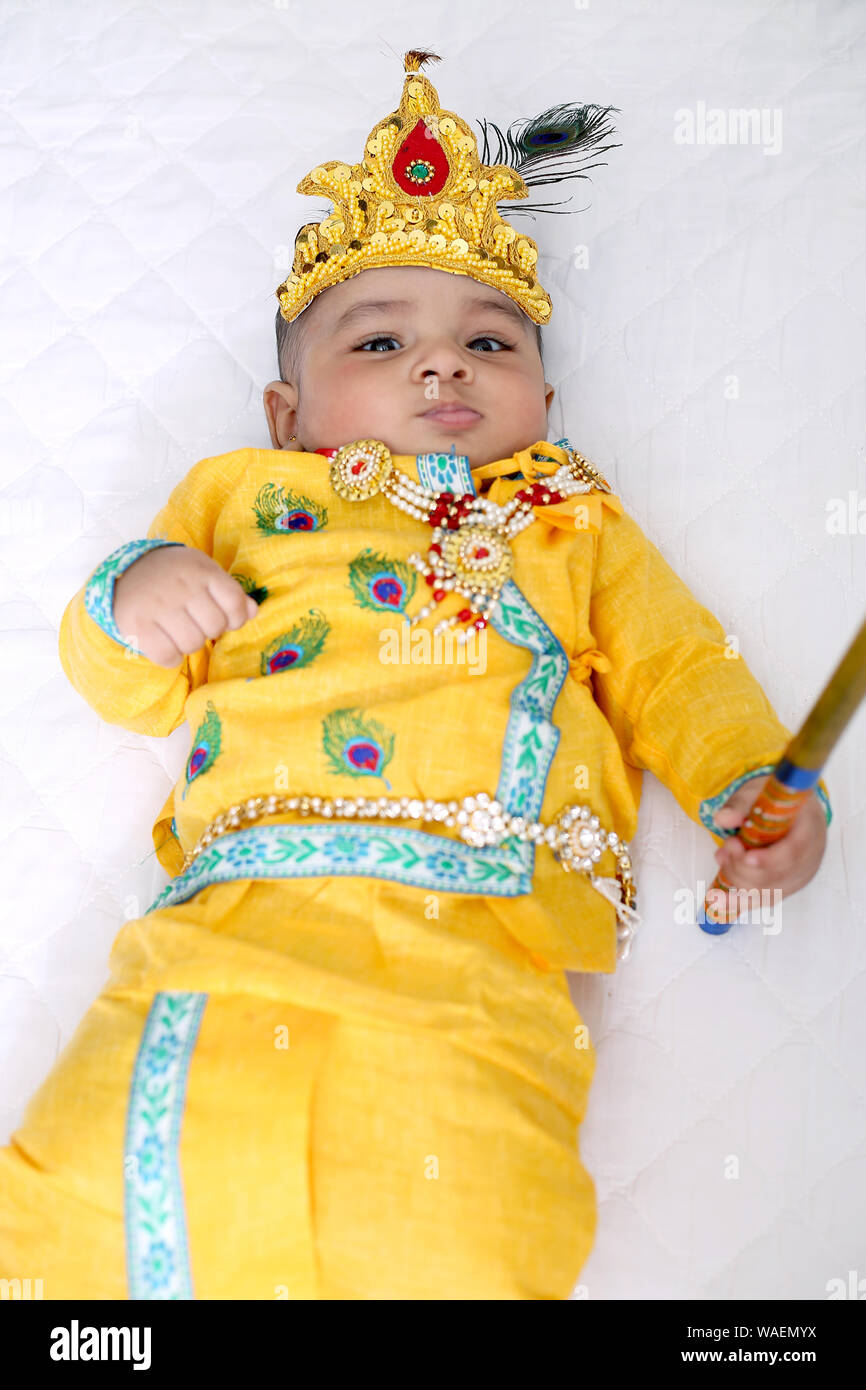 small baby in krishna dress