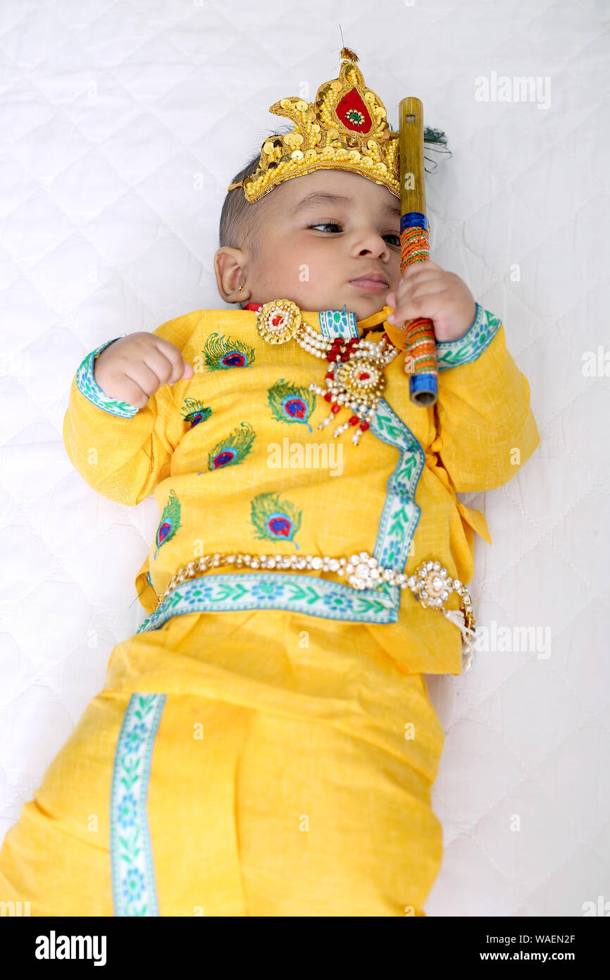 Small baby in krishna dress sales