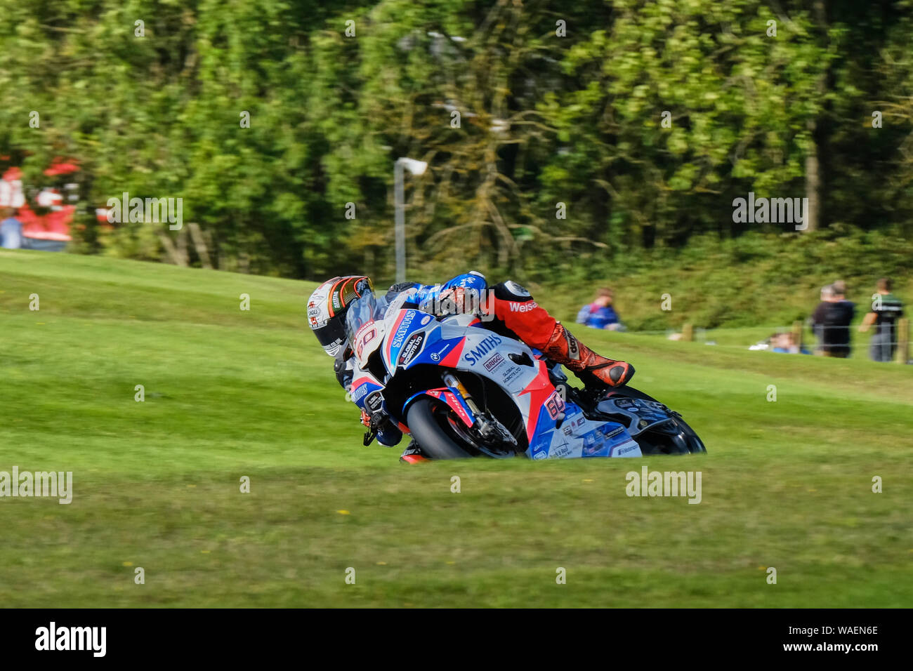 Peter Hickman powers his Smiths Racing BMW S1000RR around Charlies Bend during BSB Cadwell Park 2019 Stock Photo