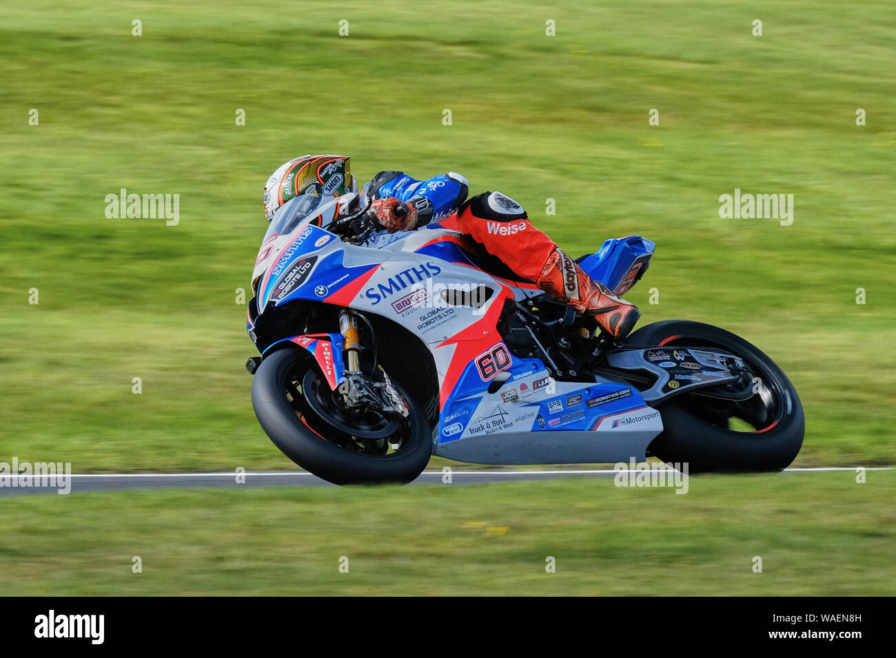 Peter Hickman powers his Smiths Racing BMW S1000RR around Charlies Bend during BSB Cadwell Park 2019 Stock Photo