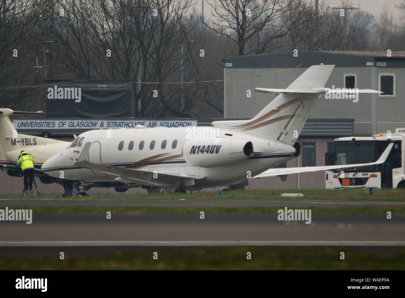 Glasgow, UK. 1 March 2019. Private Jet of Anthony Horbal seen at Glasgow International Airport.  It had just landed hours ago from Farnborough Airport in England, where it stopped for 4 hours at Glasgow. A number of pieces of luggage is seen been loaded on through the front left door into the cabin before the door is closed up and the plane taxis for take off.  It is bound for Goose Bay in Canada, then it stopped for a 90 minute re-fuelling stop before flying for another 3 hours to Pittsburgh, Pennsylvania in the USA.  The private jet (reg N144UV) is registered to Screaming Eagle Aviation Inc, Stock Photo