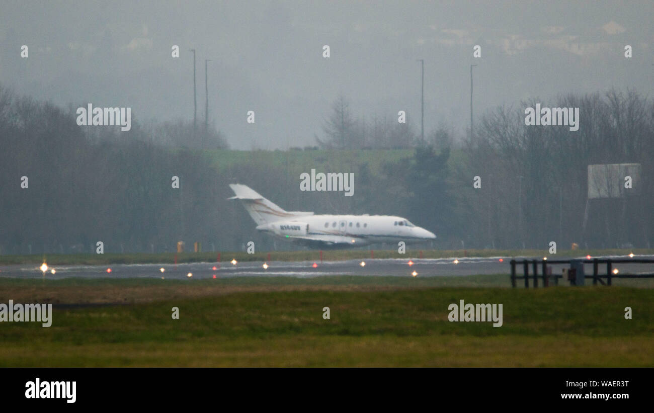 Glasgow, UK. 1 March 2019. Private Jet of Anthony Horbal seen at Glasgow International Airport.  It had just landed hours ago from Farnborough Airport in England, where it stopped for 4 hours at Glasgow. A number of pieces of luggage is seen been loaded on through the front left door into the cabin before the door is closed up and the plane taxis for take off.  It is bound for Goose Bay in Canada, then it stopped for a 90 minute re-fuelling stop before flying for another 3 hours to Pittsburgh, Pennsylvania in the USA.  The private jet (reg N144UV) is registered to Screaming Eagle Aviation Inc, Stock Photo