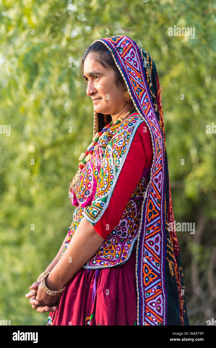 Ahir Woman in traditional colorful cloth, Great Rann of Kutch Desert, Gujarat, India Stock Photo
