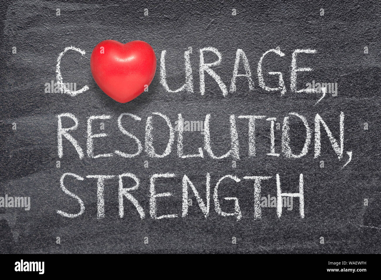 courage, resolution, strength words written on chalkboard with red ...