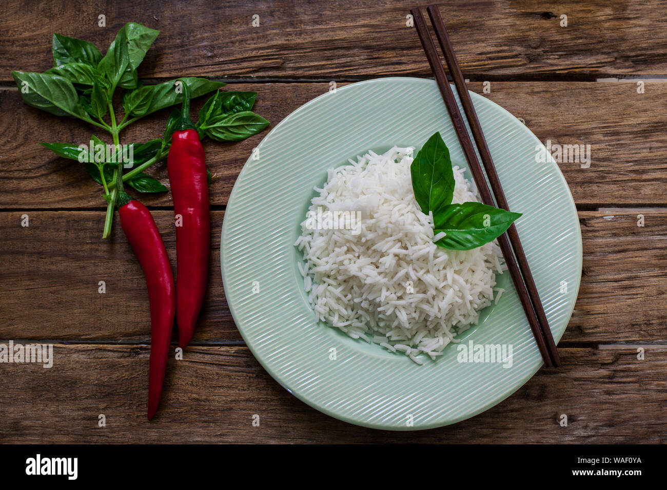 a dish of basmati indian style rice with chili pepper Stock Photo - Alamy