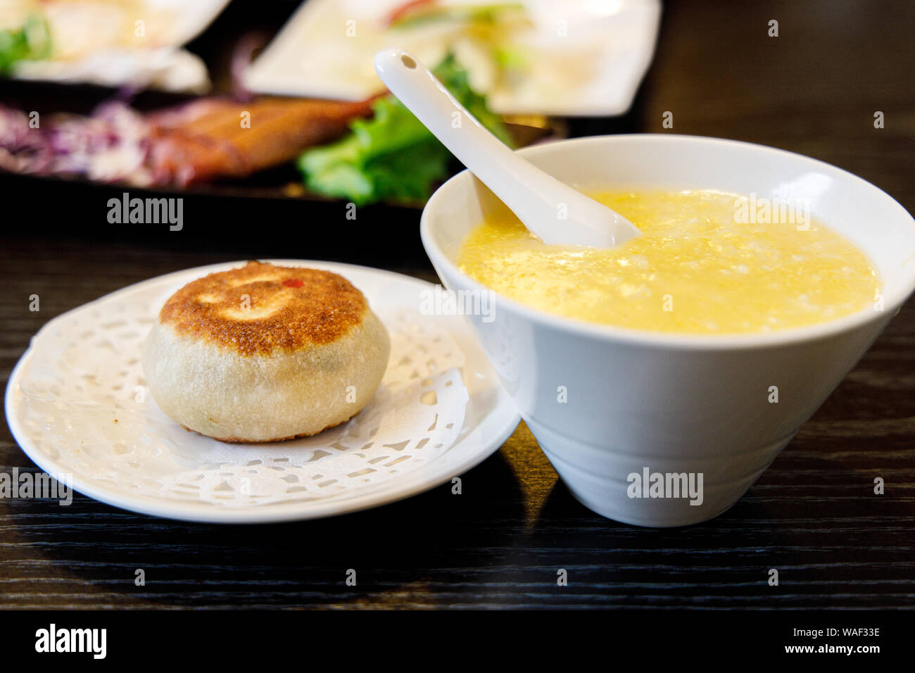 Delicious Taiwanese styled rice porridge and beef dumpling Stock Photo ...