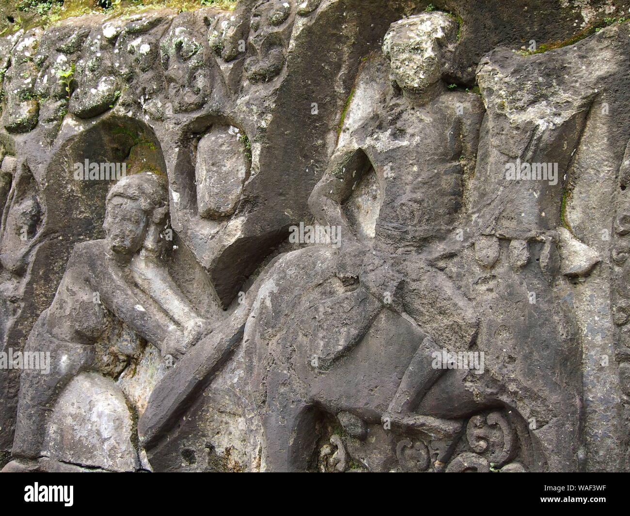 Bali Yeh Pulu wall carvings Stock Photo