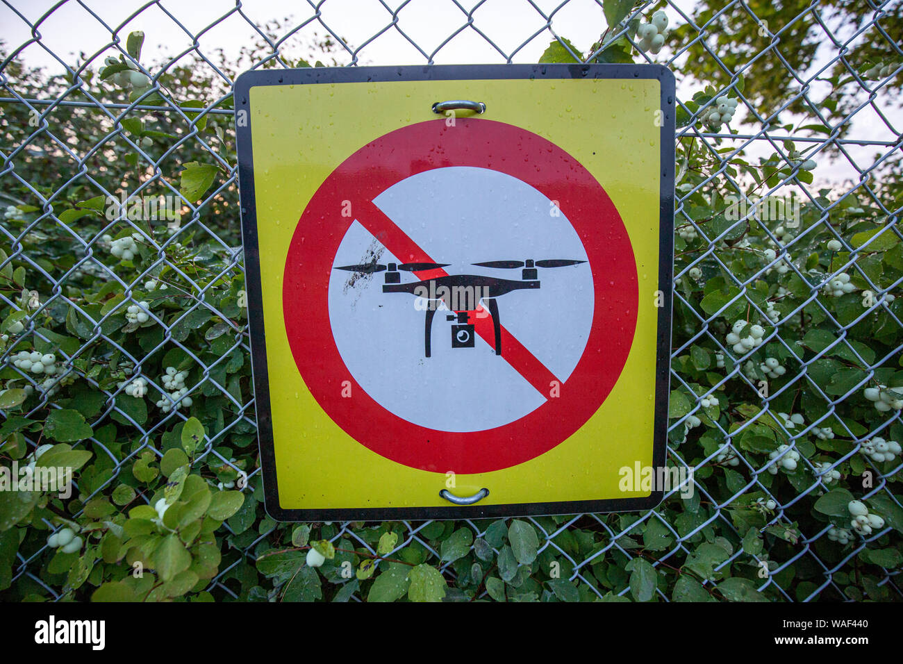 No Drone Warning Sign at Fence Stock Photo