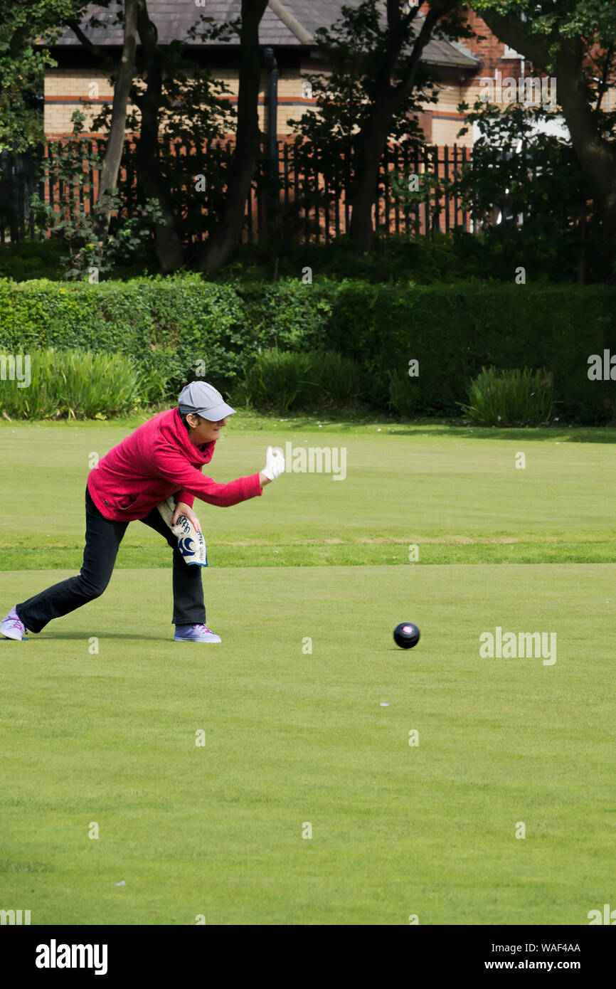 Woman playing bowls at the 2019 Southport Flower Show. Stock Photo