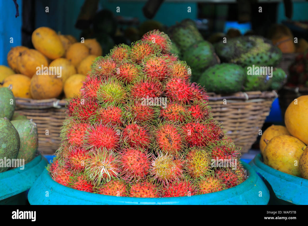 Fresh rambutan fruit in the market close up Stock Photo