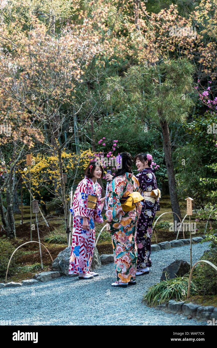 Japanese women with kimono in Sogenchi Garden, Tenryuji Temple, Sagatenryuji Susukinobabacho, Kyoto, Japan Stock Photo