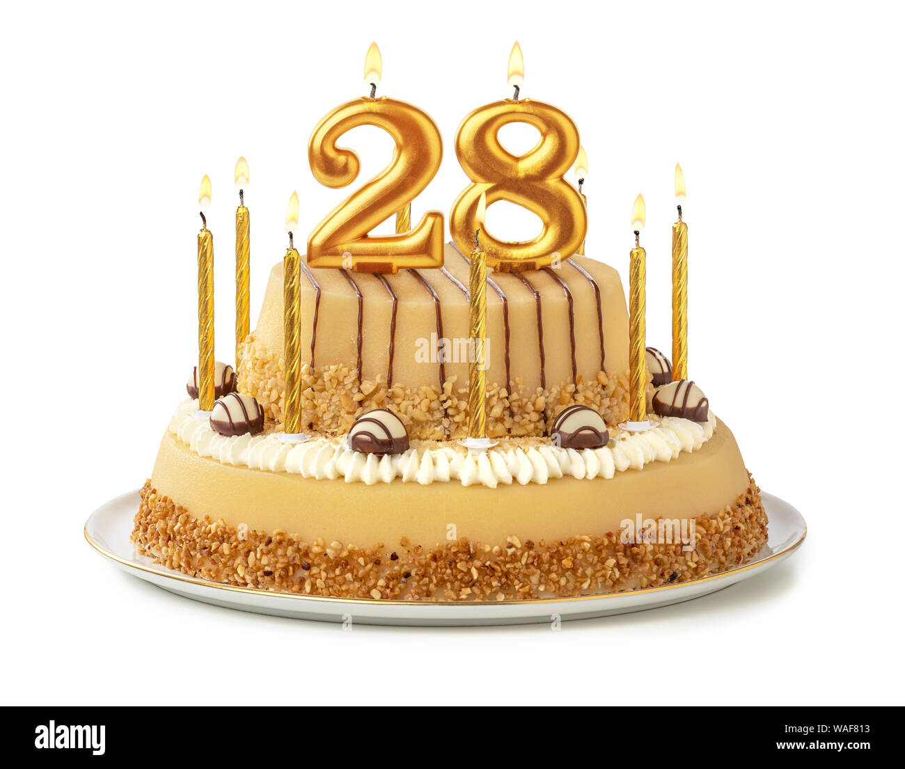 Festive cake with golden candles - Number 28 Stock Photo
