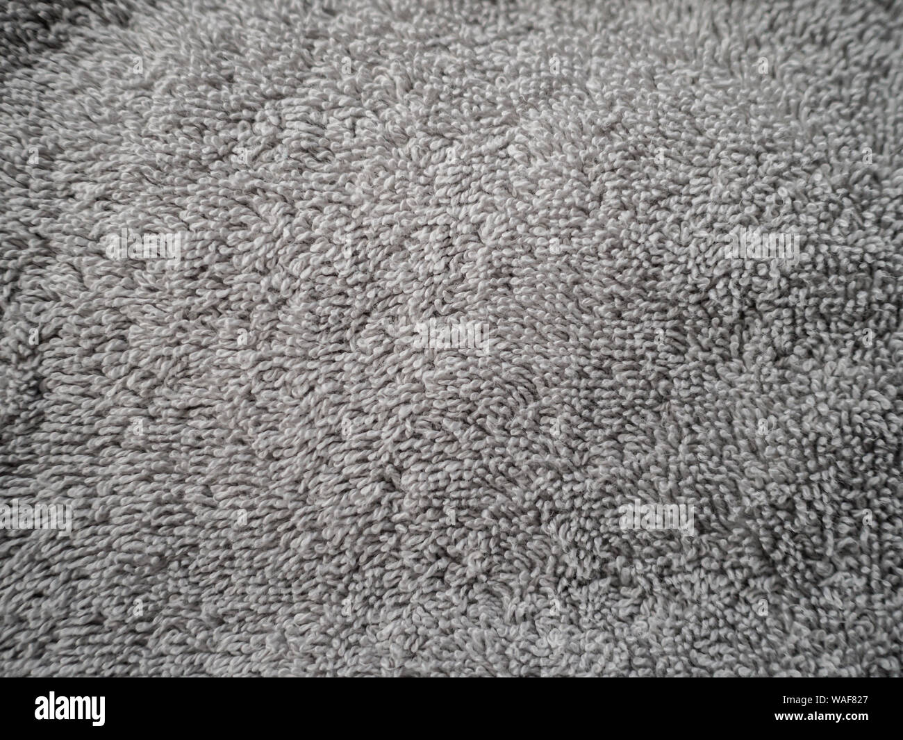 Background textured silver grey cotton towelling fabric Stock Photo