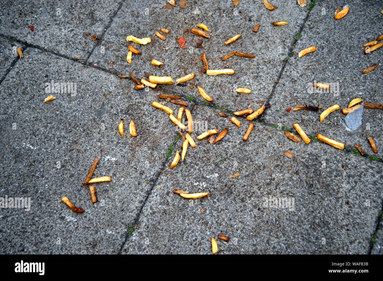 London. Thrown away chips Stock Photo