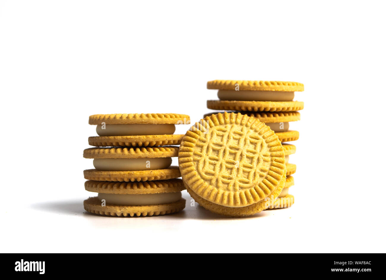 Golden biscuit sweet cookies isolated on white Stock Photo Alamy